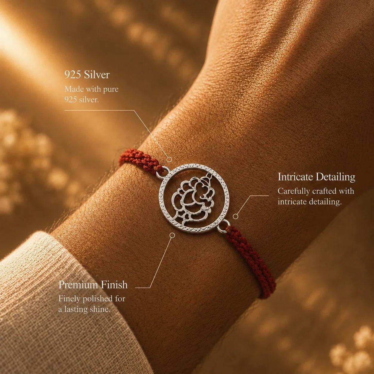 925 silver Round Ganesha rakhi with a Ganesha motif in a circular frame on a red braided thread