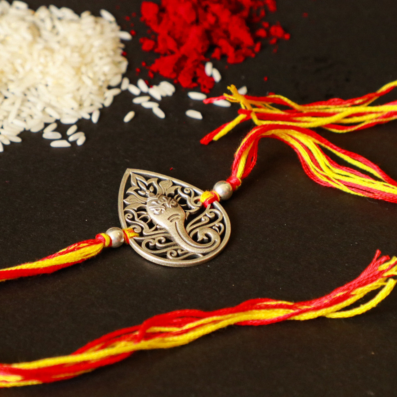 925 Silver Lord Ganesha on leaf Rakhi - 4103