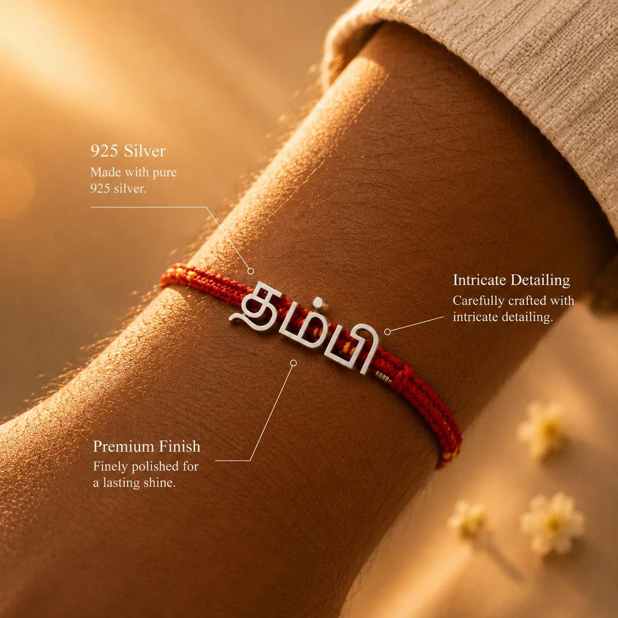 925 silver Tamil Thambi rakhi with தம்பி engraved in Tamil script on a red braided thread